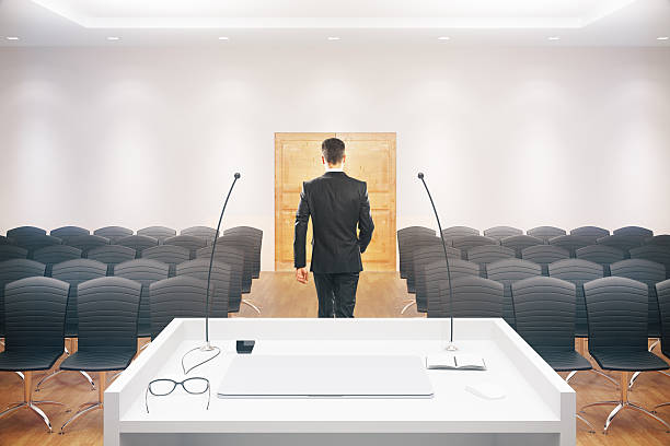 Businessman leaving conference hall