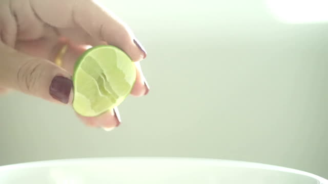 Squeezing a Piece of Lime