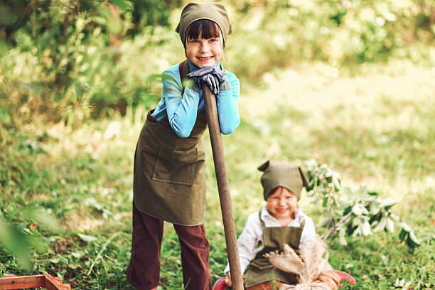 istock Children in garden. 578266500