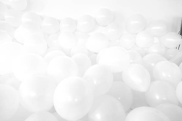 istock Sea of white balloons 578269292