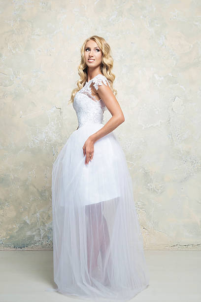 istock Bride in white wedding dress. Blonde 578273360