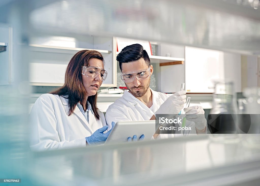 Scientists Using Tablet Computer In Lab Stock Photo - Download Image ...