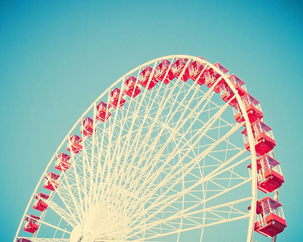 istock Vintage ferris wheel on blue sky 578276138
