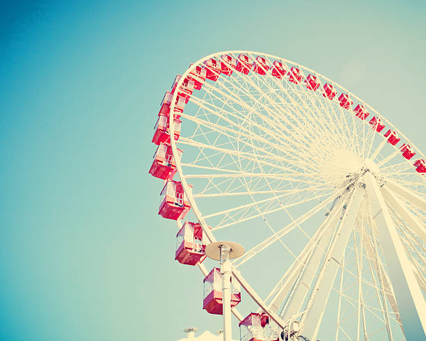 istock Vintage ferris wheel on blue sky 578276244