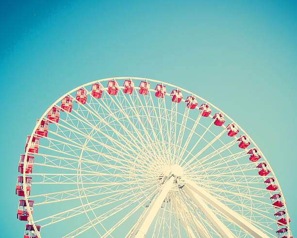istock Vintage ferris wheel on blue sky 578276396
