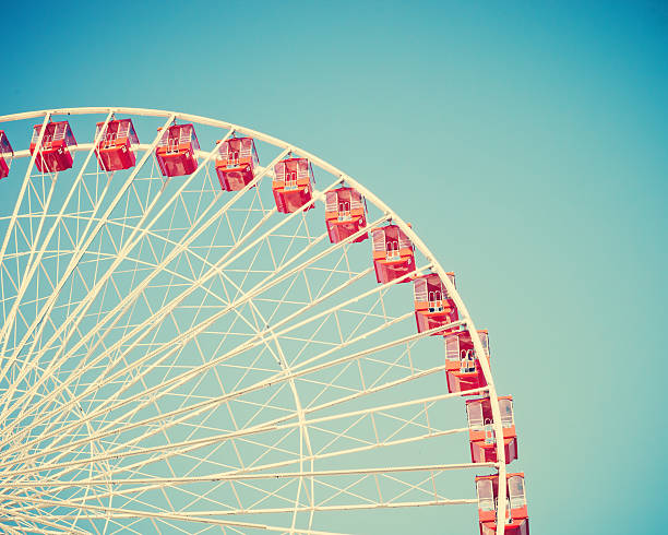 istock Vintage ferris wheel on blue sky 578276502