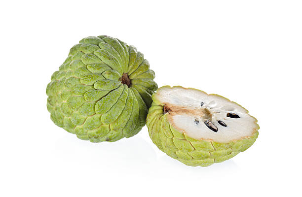 istock whole and half cut custard apple fruit on white background 578279870