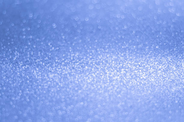 istock Glittery shiny lights blue abstract background 578283354
