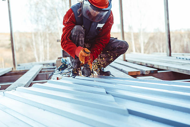 istock the masked man sawing off the iron 578285696