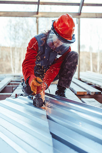 istock the masked man sawing off the iron 578285738