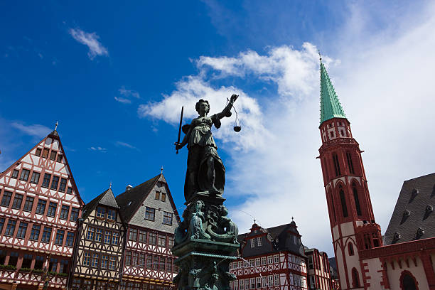 istock The old town with the Justitia statue in Frankfurt 578289070