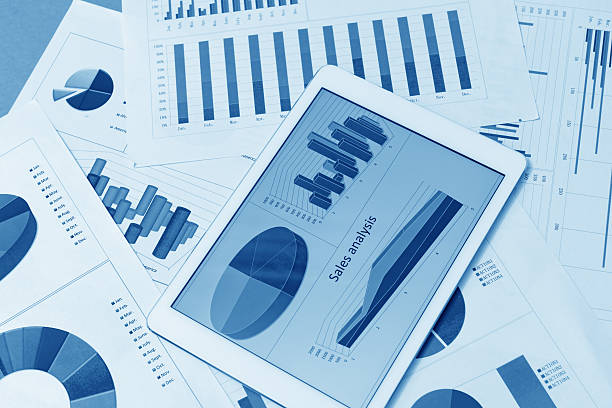 istock Financial charts on the table with tablet 578289954