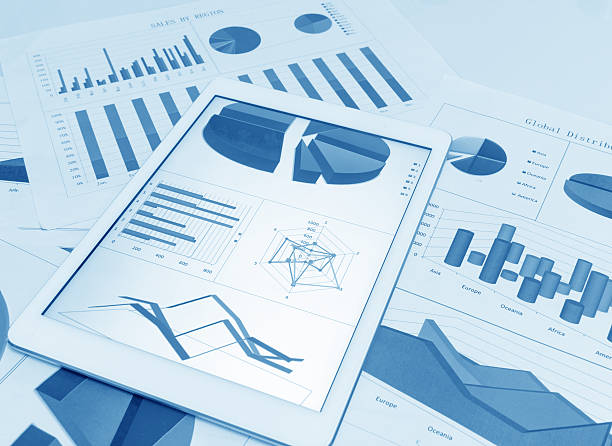 istock Financial charts on the table with tablet 578290194