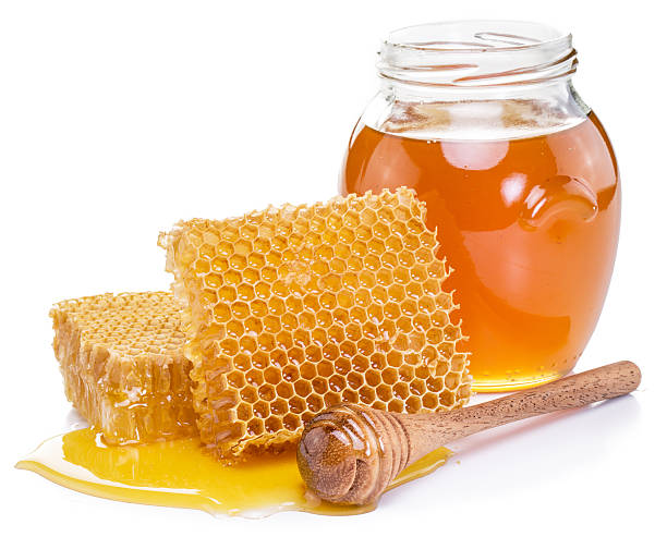 istock Jar full of fresh honey and honeycombs. 578291074