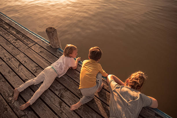 istock Family by the lake 578293118