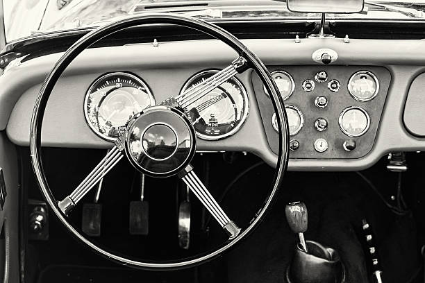 istock Steering wheel and dashboard in historic vintage car 578294410