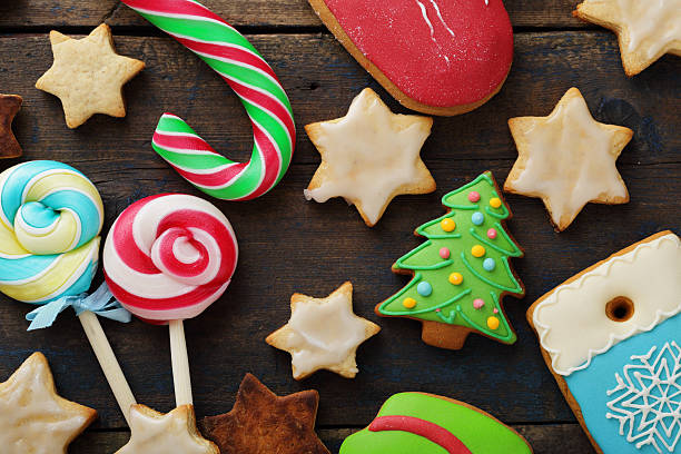istock christmas candy and cookies on wooden background 578295510
