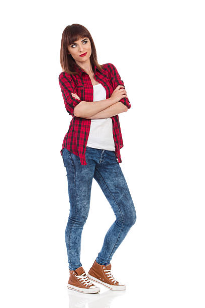istock Skeptic Girl Looking Away Full Length 578296132