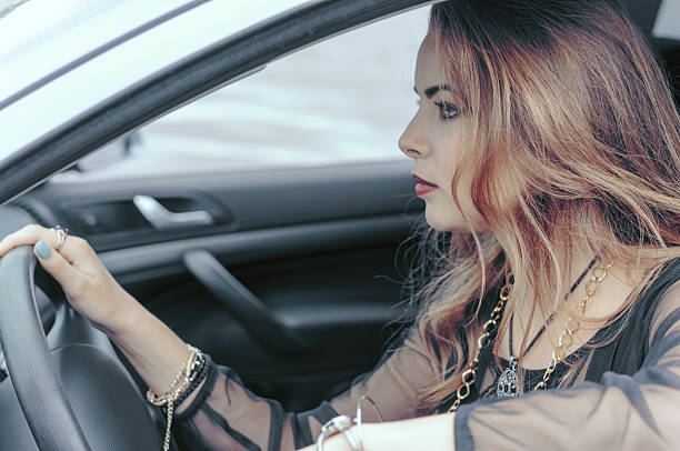 istock Woman is driving a car 578297156