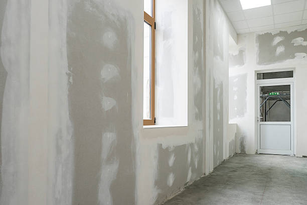 istock Unfinished apartment interior with white door 578297586