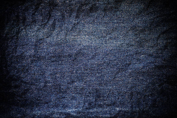 istock Denim jeans texture, with crumpled vignette border 578299856
