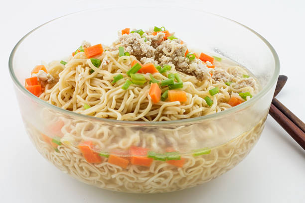 istock Bowl of instant noodles on white background. Chopsticks. 578306596