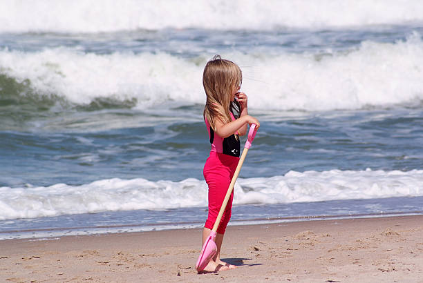 istock Three-year girl on the beach 578306718