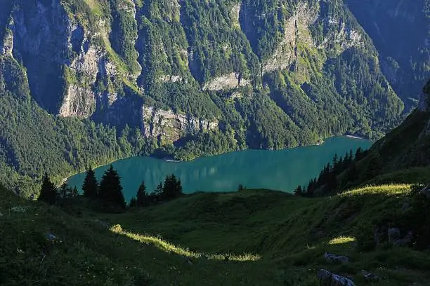 Lake Klontalersee seen from Obere Scheiterboden. Summer scene in the Swiss Alps.