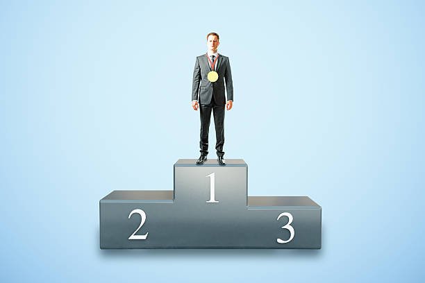 istock Businessman on pedestal 578308720