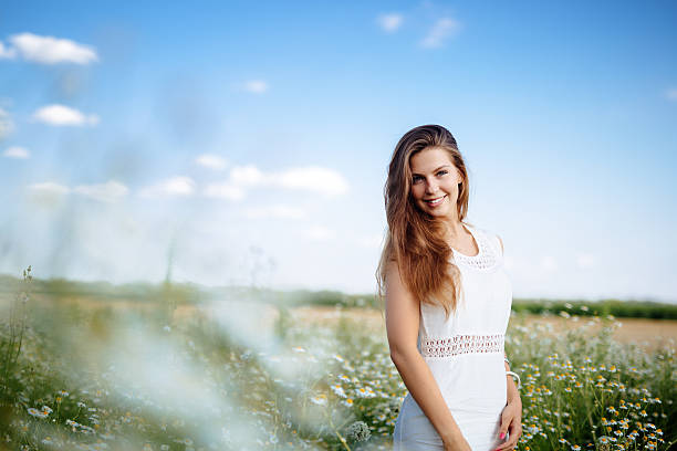 istock Beautiful woman in field 578312270