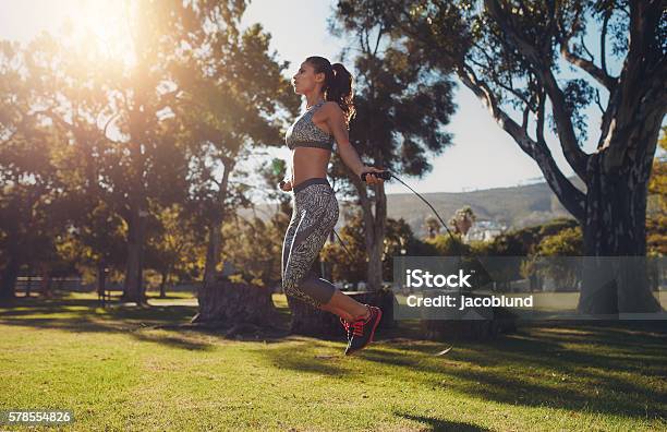 Fit Young Woman Skipping With A Jump Rope Stock Photo - Download Image Now - Jumping Rope, Jump Rope, Jumping