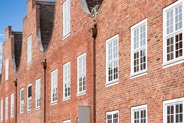 istock Brick facade of typical dutch houses 578554900