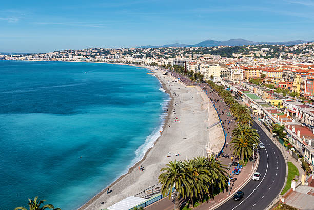 promenade des anglais, em nice, frança - city of nice france beach promenade des anglais - fotografias e filmes do acervo