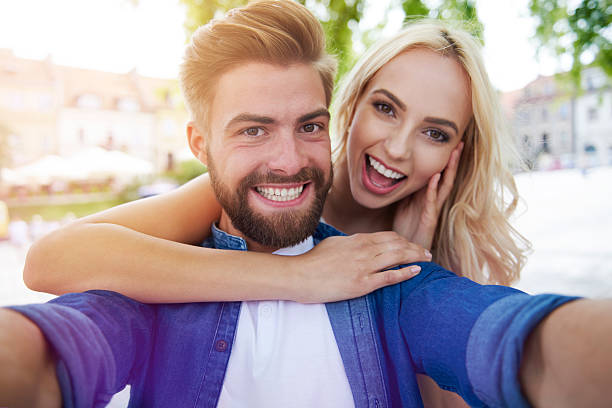 istock Selfie taken by happy young couple 578557732