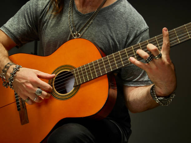 istock The guy playing an acoustic guitar. 578559382