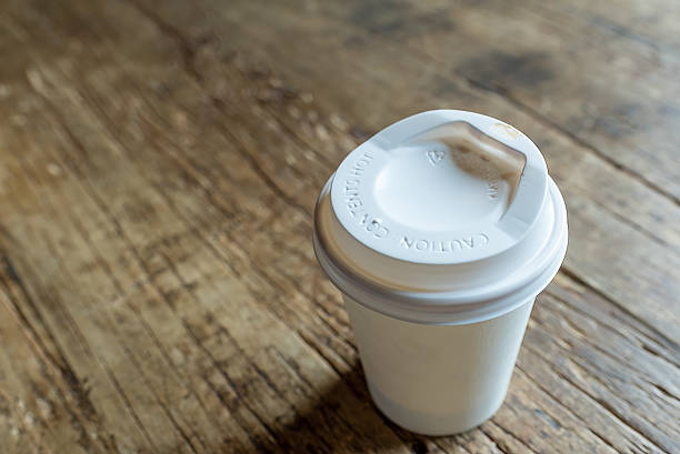 istock takeaway paper cup on wooden table 578559532