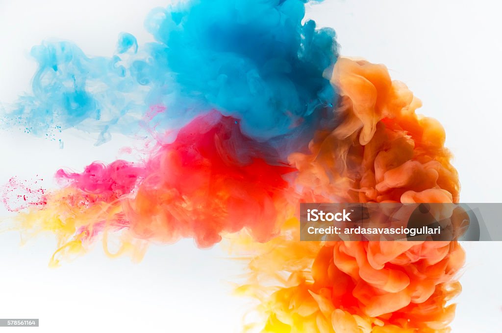 Paint splash on a white background. Red, yellow and blue colors paint splash on a white background. Colors Stock Photo