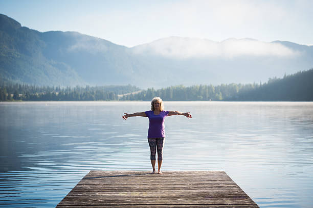 istock Senior aged woman practicing yoga 578562176