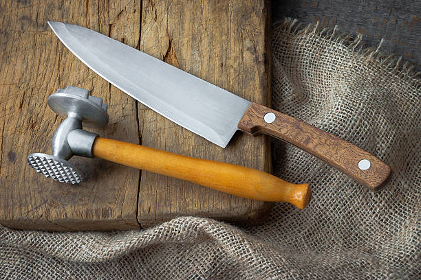 istock Hammer for meat and knife 578563432