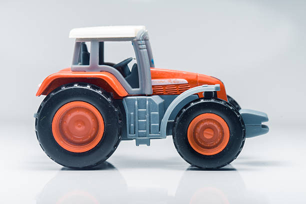 istock Children plastic toy tractor 578563562