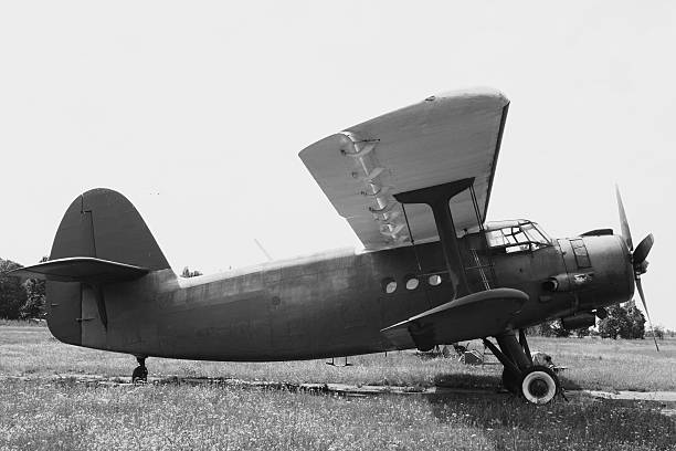 istock Biplane on the airfield. Side view. Black and white. 578565290