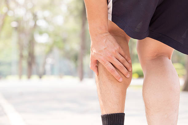 istock Cramp in leg while exercising. Sports injury concept 578565472