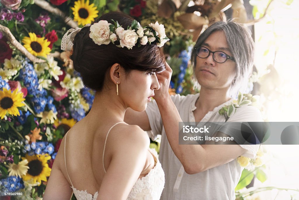 Florist Artist with Bride Florist Stock Photo