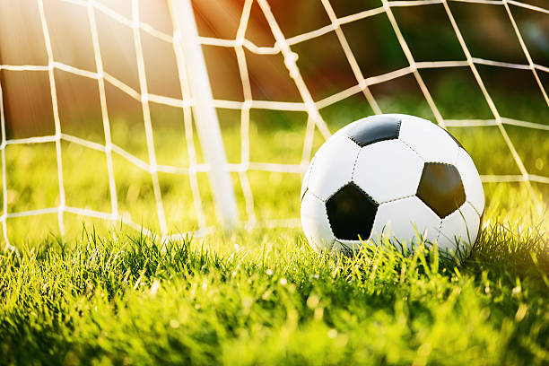 istock Soccer ball in goal 578566242