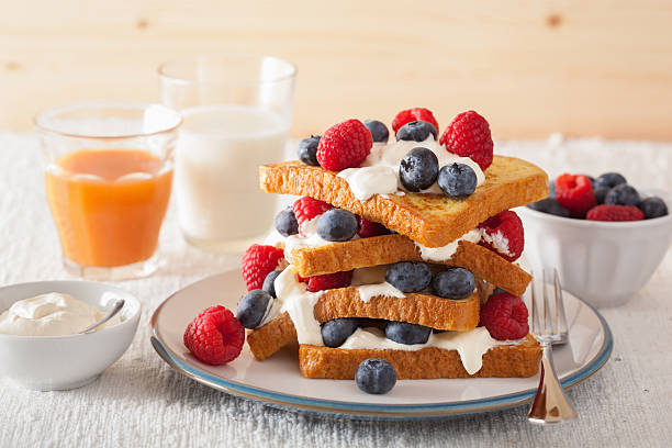 istock french toasts with creme fraiche and berries for breakfast 578566396