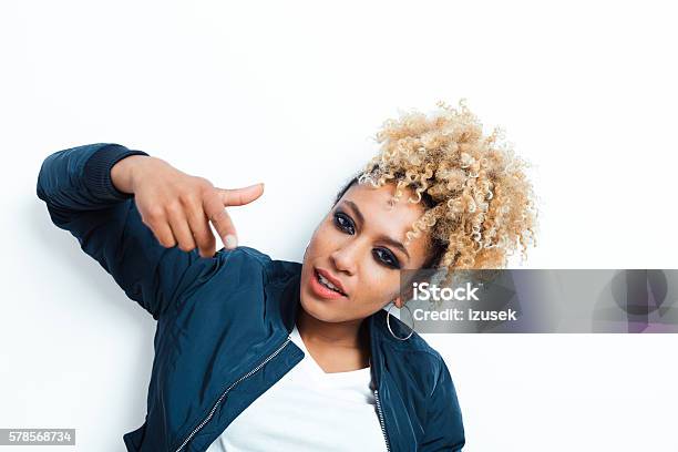 Portrait Of Cool Afro American Young Woman Stock Photo - Download Image Now - Bomber Plane, Jacket, Adult