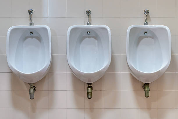 istock urinals in men's room 578569940