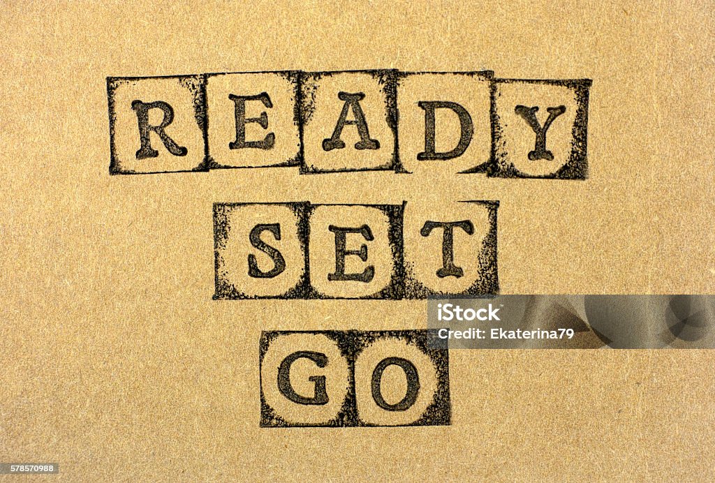 Ready Set Go Words Ready Set Go make by black alphabet stamps on cardboard. Go - Single Word Stock Photo