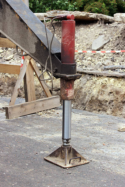 istock Truck strong outrigger stabilizing legs extended. Working leg  from a 578572028
