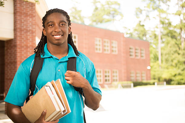 istock African-descent boy on college school campus. 578573120
